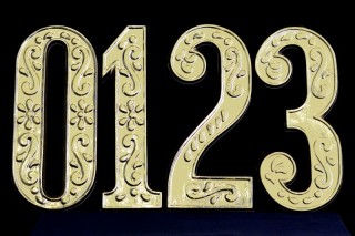 numbers 0-3 thermoformed gold-colored