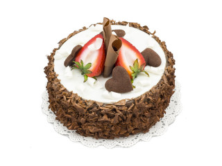 chocolate cake with strawberries/hearts