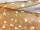 Stoff Organza "Sterne" terra Sterne gold, B 150 cm