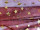Stoff Organza "Sterne" rot Sterne gold, B 150 cm